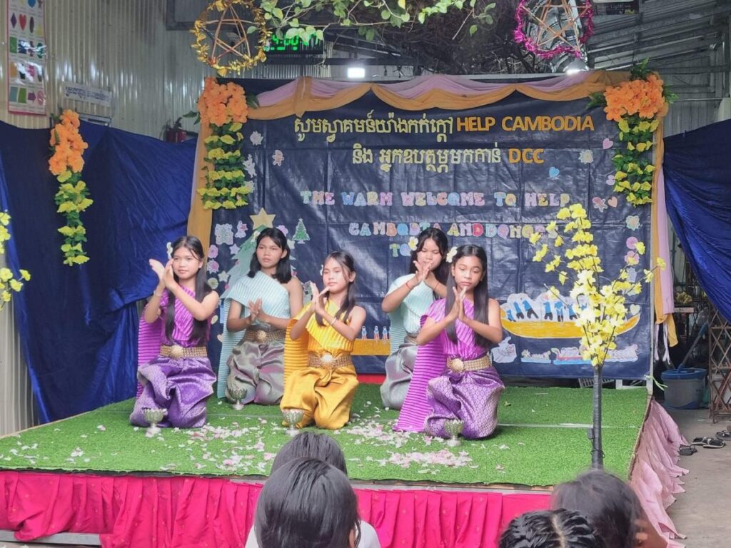 Students performing traditional Khmer dance on stage