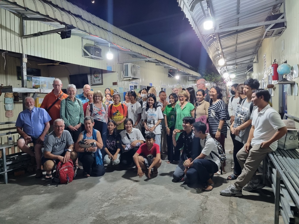 The HELP Cambodia tour group with DCC students and teachers