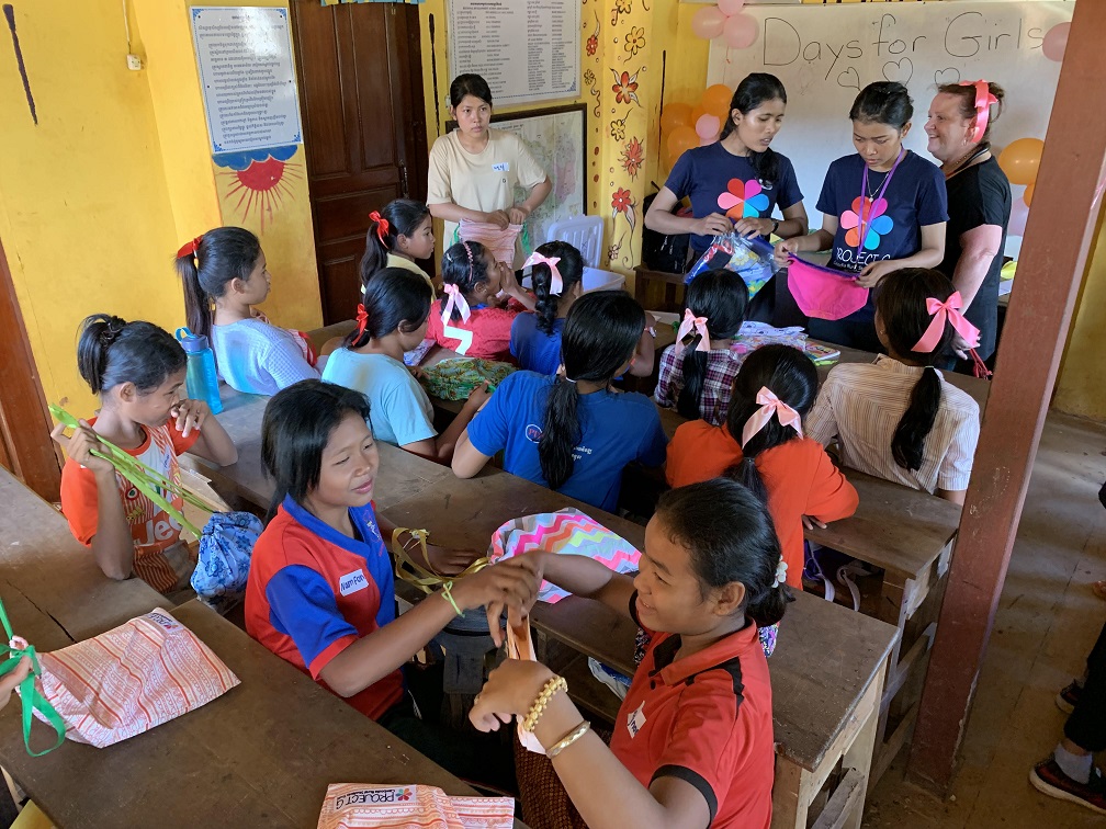 Girls in a classroom during a Days for Girls menstrual health session